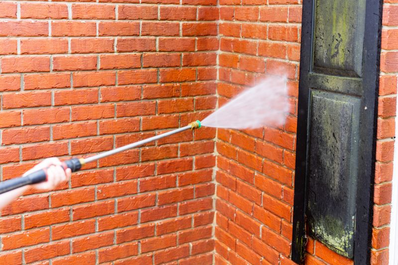 Cleaning a brick wall